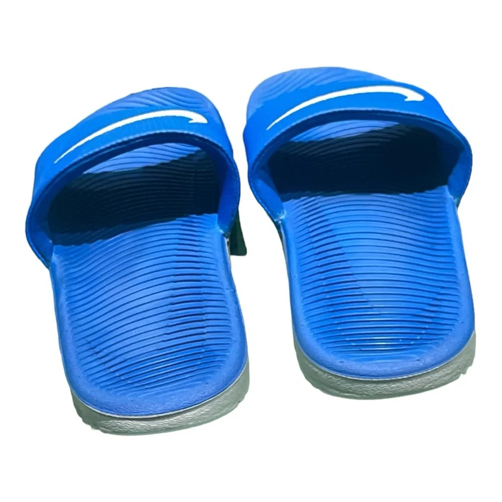 Nike Unisex Royal Blue Sides Size 7Y.